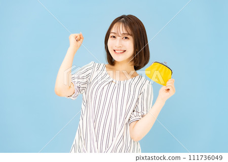 Young woman 20s money wallet fist pump Young woman 20s money wallet fist pump 111736049