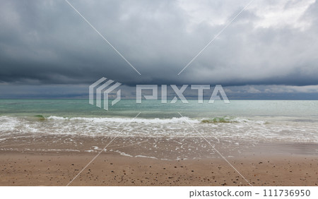 On the beach in Skagen after heavy rain, Denmark. 111736950