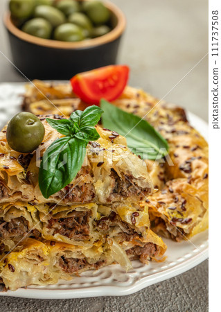 turkish pie with meat. burek pie. Food recipe background. Close up 111737508
