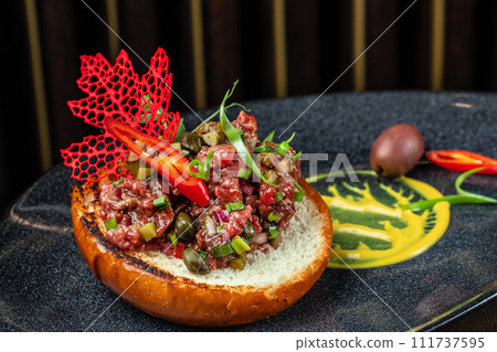 Gourmet tartar raw from beef fillet Gourmet tartar raw from beef fillet 111737595