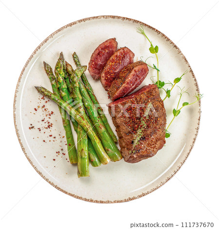 grilled beef steak with green asparagus isolated on white background, Roast beef with vegetables 111737670