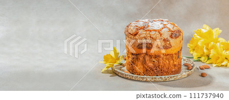 Delicious Easter cake with almonds flowers on light background Delicious Easter cake with almonds flowers on light background 111737940