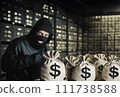 Bank robbery. Criminal in mask with bags of money. Money bags from bank in hands of robber.  111738588
