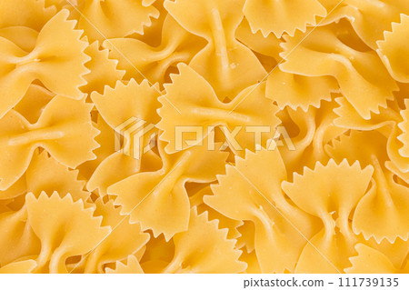 Uncooked farfalle pasta Uncooked farfalle pasta 111739135