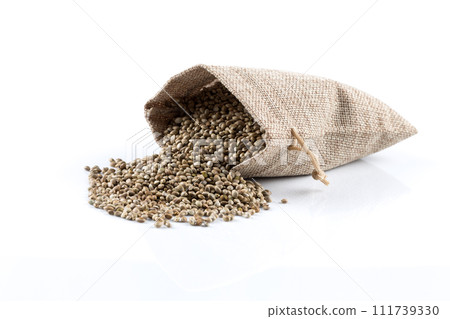 Cannabis Hemp seeds in sack on white Cannabis Hemp seeds in sack on white 111739330