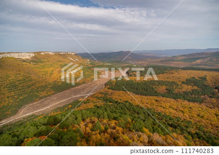 The autumn landscape of the mountain valley is an amazing, beautiful place at any time of the year. Hiking. Nature The autumn landscape of the mountain valley is an amazing, beautiful place at any time of the year. Hiking. Nature 111740283