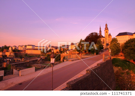 Grand Duchy of Luxembourg, a country in the Benelux, capital of world cultural heritage, view of Saint-Michel church in the morning sun Grand Duchy of Luxembourg, a country in the Benelux, capital of world cultural heritage, view of Saint-Michel church in the morning sun 111741371