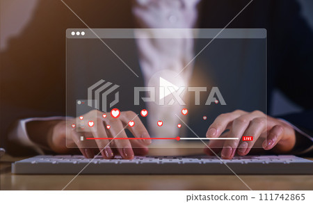 Businesswoman using computer and watching live stream online screen, meeting or webinar online concept. 111742865