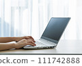 Hand using laptop and type on the keyboard. Mockup screen of advertisement. 111742888