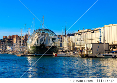 Biosphere glass sphere with a rainforest ecosystem in Porto Antico, Old Port, Genoa, Liguria, Italy Biosphere glass sphere with a rainforest ecosystem in Porto Antico, Old Port, Genoa, Liguria, Italy 111743242