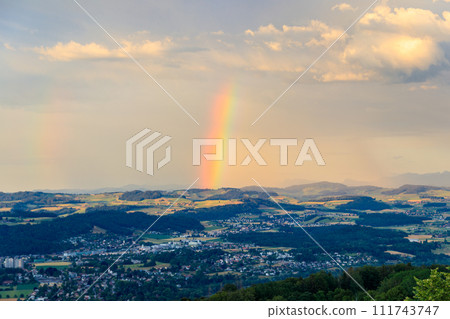 Beautiful rainbow over Bern city in Switzerland Beautiful rainbow over Bern city in Switzerland 111743747