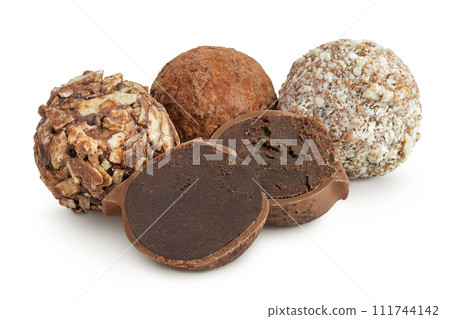 A variety of different truffles Isolated on a white background A variety of different truffles Isolated on a white background 111744142