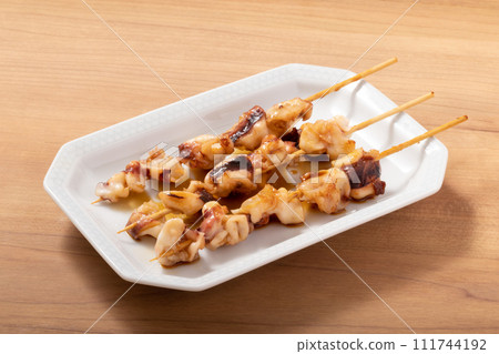 Squid cartilage skewers (sauce) 111744192