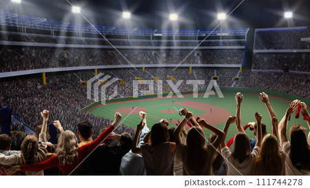 Back view of emotional people, football fans standing at crowded stadium during soccer match event in evening, cheering up favorite team 111744278