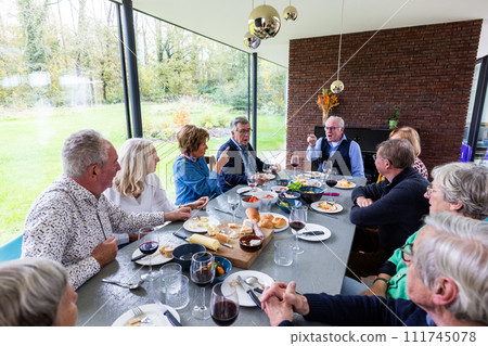 Intimate Family Brunch in a Modern Sunlit Room Intimate Family Brunch in a Modern Sunlit Room 111745078