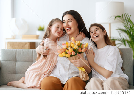 daughters and mom with flowers daughters and mom with flowers 111745125