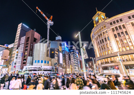 Tokyo cityscape in Japan February...Ginza is crowded with foreign tourists. San-ai demolition work progresses...toward a new era = 18th Tokyo cityscape in Japan February...Ginza is crowded with foreign tourists. San-ai demolition work progresses...toward a new era = 18th 111745624