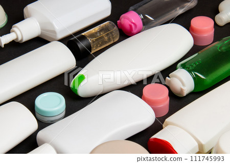 Group of plastic bodycare bottle Flat lay composition with cosmetic products on colored background empty space for you design. Set of White Cosmetic containers, top view with copy space 111745993