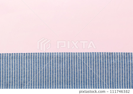 top view with blue kitchen napkin isolated on table background. Folded cloth for mockup with copy space, Flat lay. Minimal style 111746382