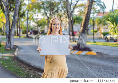pregnant woman takes a stand for the rights of pregnant women, engaging in a solo picket to advocate for awareness, support, and the empowerment of expectant mothers 111748728