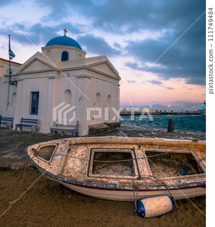 Old boat with greek church 111749484
