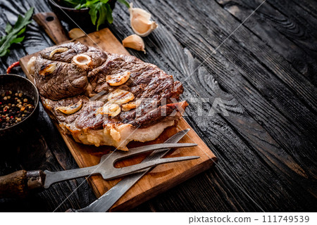 Grilled meat on a table Grilled meat on a table 111749539