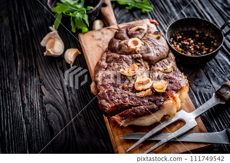 Grilled meat on a table Grilled meat on a table 111749542