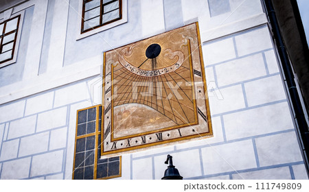 Anchient sun clock in Cesky Krumlov Anchient sun clock in Cesky Krumlov 111749809