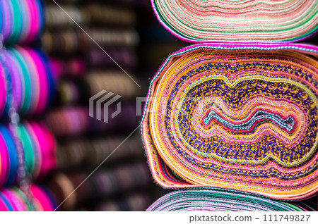 Rolls of fabric at the shelf Rolls of fabric at the shelf 111749827