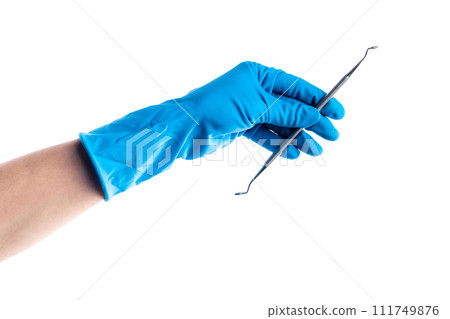 Hand in blue glove holding dental metal stick isolated 111749876