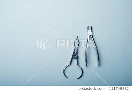 Dental metal flatterns and clamps 111749882