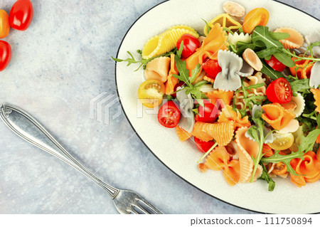 Pasta salad with vegetables. 111750894