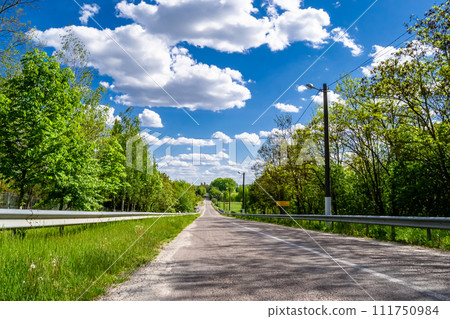 Beautiful empty asphalt road in countryside on colored background Beautiful empty asphalt road in countryside on colored background 111750984
