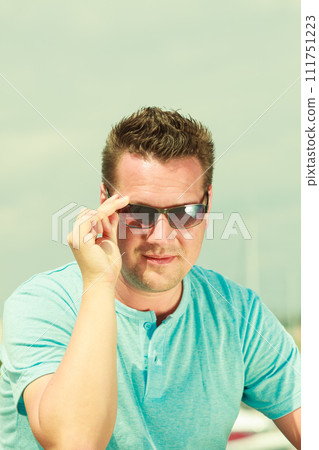 Portrait of handsome guy during summertime Portrait of handsome guy during summertime 111751223