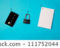 Credit card, lock and envelope hanging on the hooks. Phishing concept 111752044