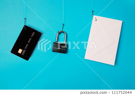 Credit card, lock and envelope hanging on the hooks. Phishing concept 111752044