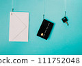 Phishing, data stealing concept. Envelope, credit card and key hanging on fishing hooks. 111752048
