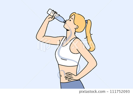 Slender woman drinks mineral water from bottle to cleanse body of toxins and harmful toxins Slender woman drinks mineral water from bottle to cleanse body of toxins and harmful toxins 111752093