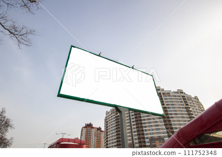 Billboard in modern area of city with white space Billboard in modern area of city with white space 111752348
