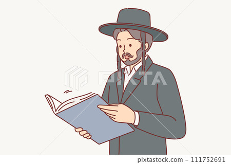 Man in jewish traditional clothing reads book or business documents and shows surprised emotions 111752691