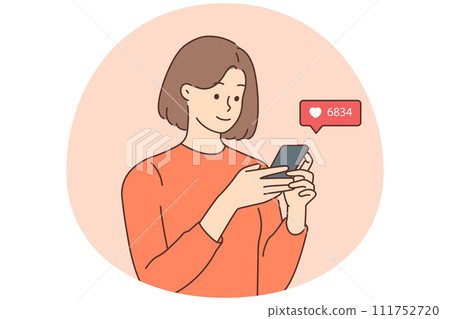 Smiling woman check likes on cellphone Smiling woman check likes on cellphone 111752720