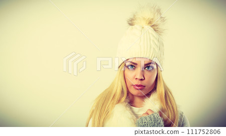Woman wearing warm winter clothing Woman wearing warm winter clothing 111752806