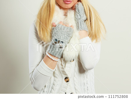 Woman wearing warm winter clothing 111752808
