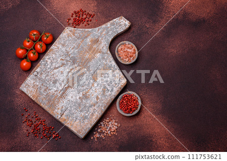 Empty rectangular wooden cutting board on textured concrete background 111753621
