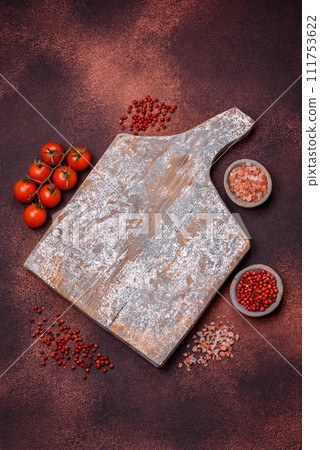 Empty rectangular wooden cutting board on textured concrete background 111753622