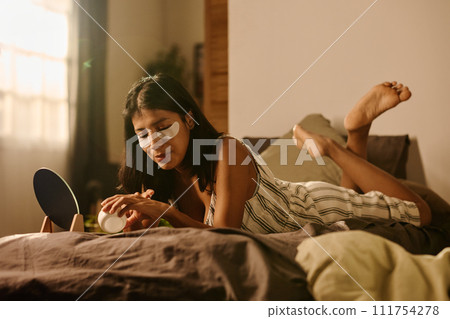 Taking care of hands after sleep 111754278
