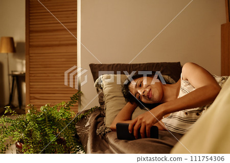 Scrolling through new online posts 111754306