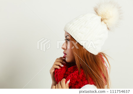 Mulatto woman wearing warm winter clothing 111754637