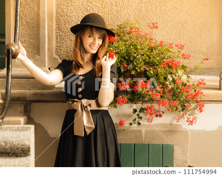 Retro style fashion woman in old town Retro style fashion woman in old town 111754994