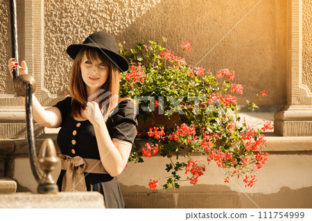 Retro style fashion woman in old town Retro style fashion woman in old town 111754999